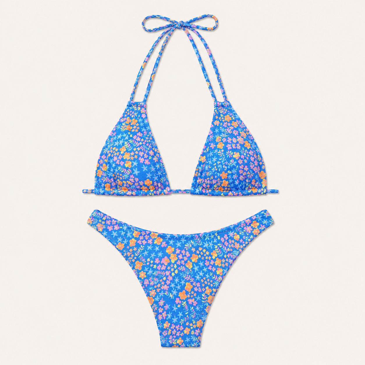Monica | Conjunto de bikini triangular para mujer de Mara Swim con delicado estampado floral y braguita tanga de corte alto